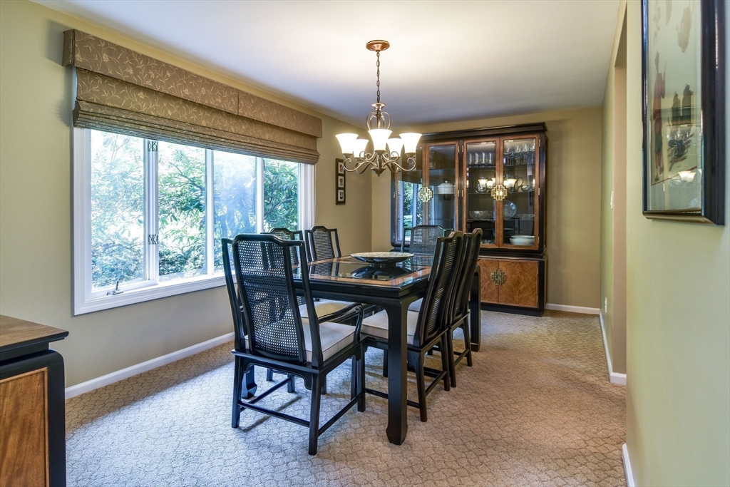 38 Stagecoach Drive Ashland, MA 01721 - Photo 7 of 29 a view of a dining room with furniture window and outside view