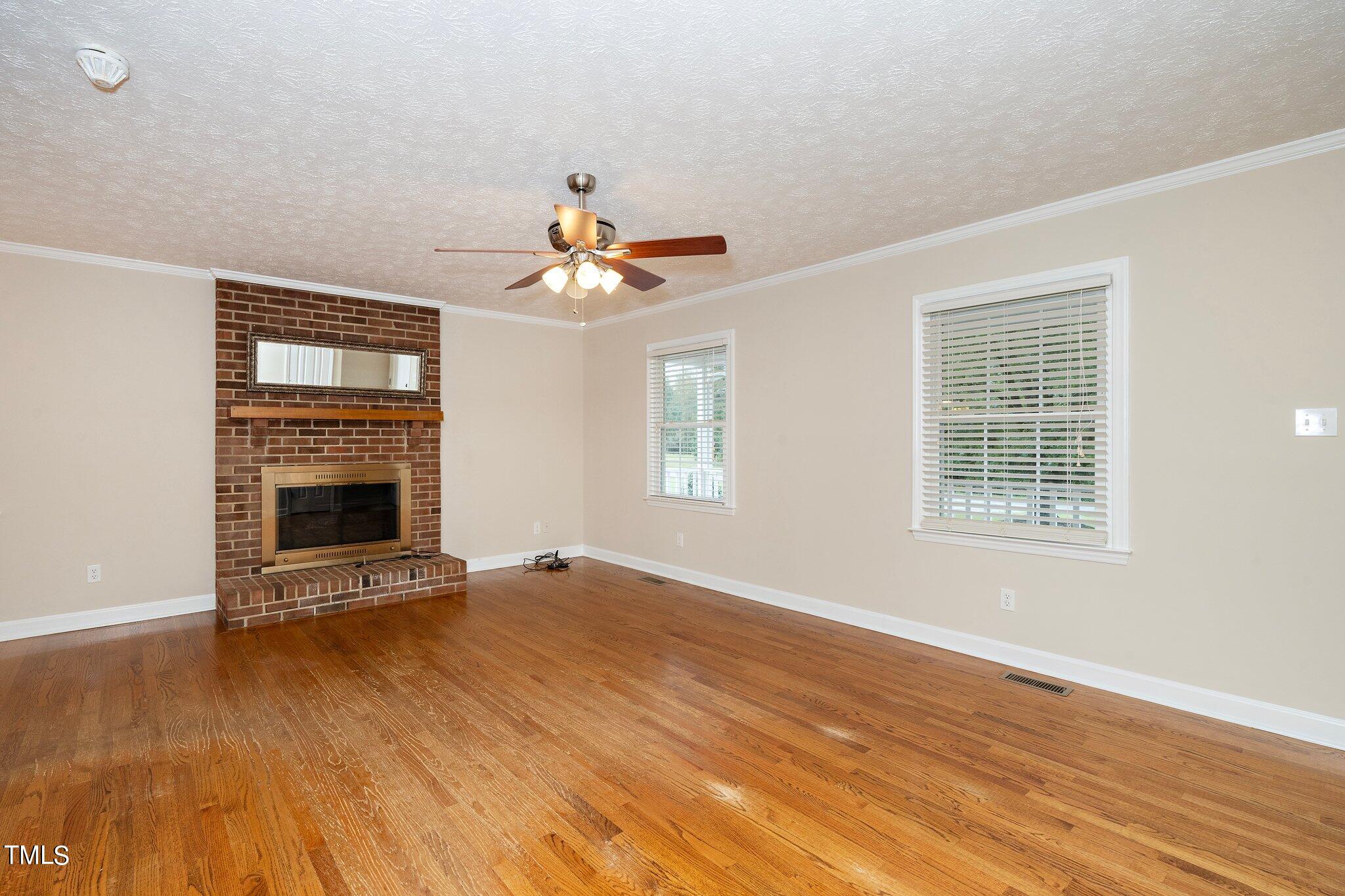 1678 Hayes Road Creedmoor, NC 27522 - Photo 11 of 25 1678 Hayes Road - Family Room Side
