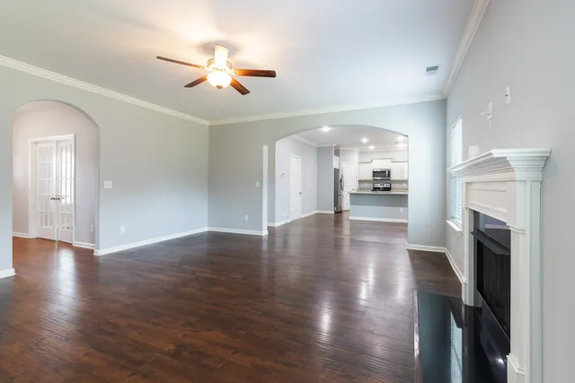 a view of a kitchen counter space and windows