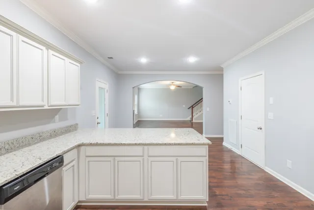 a view of kitchen with wooden floor