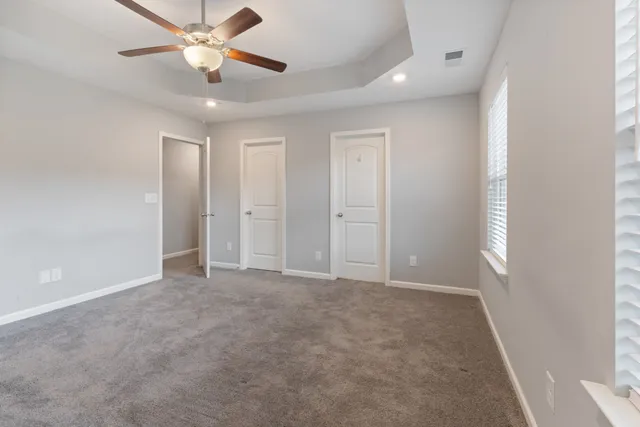 a white bath tub sitting in a bathroom