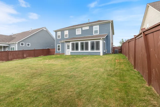 a view of a city with an outdoor space and seating area
