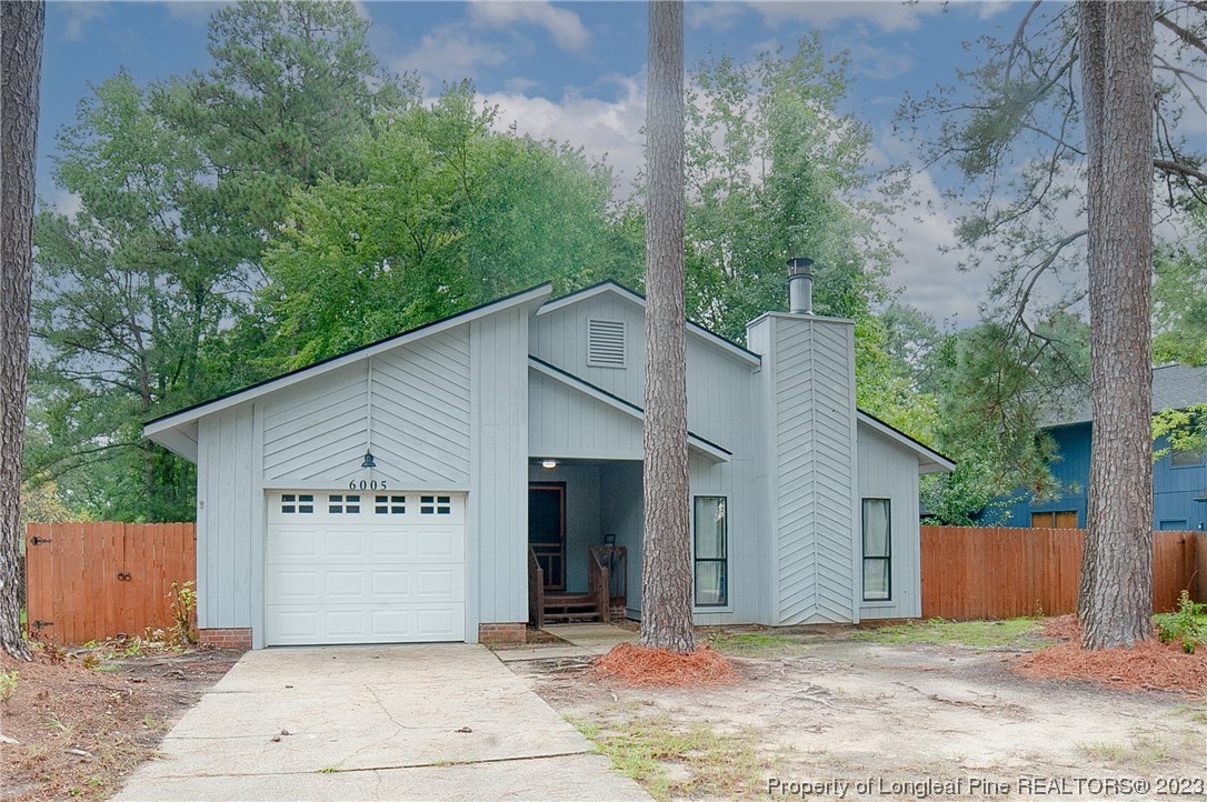 6005 Dalton Road Fayetteville, NC 28314 - Photo 1 of 44 a view of a house with a garage