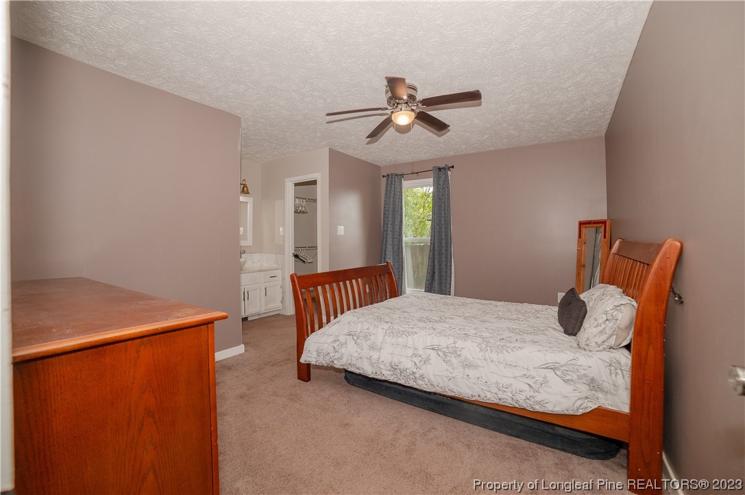 6005 Dalton Road Fayetteville, NC 28314 - Photo 25 of 44 a bedroom with a bed and window