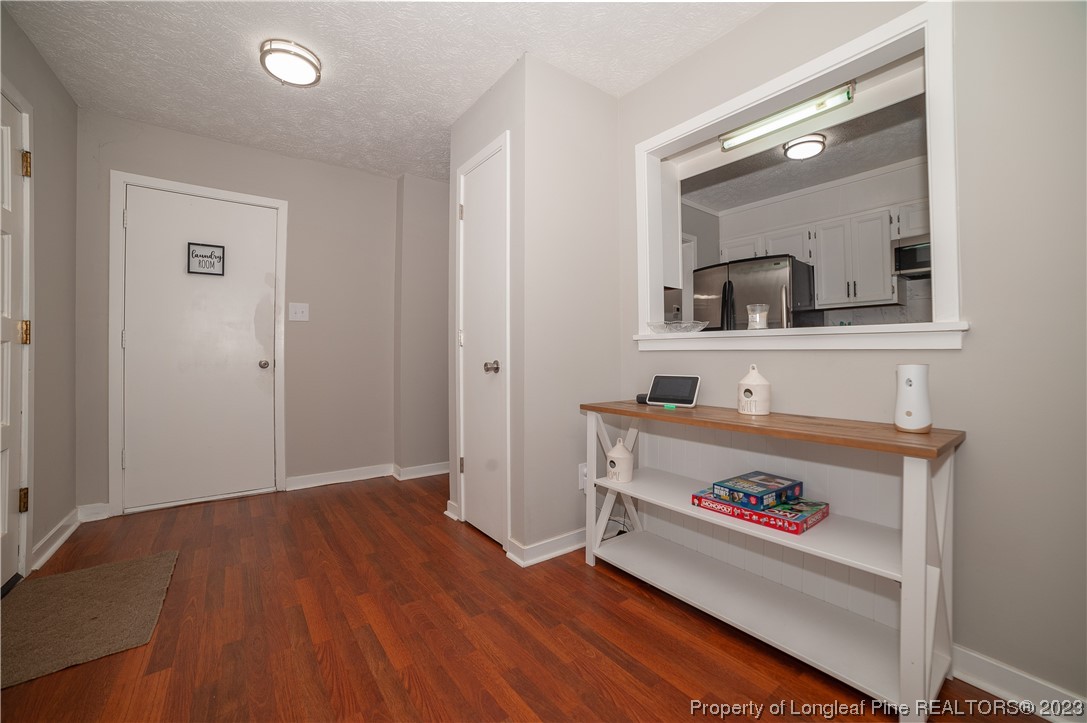 6005 Dalton Road Fayetteville, NC 28314 - Photo 5 of 44 a view of kitchen with wooden floor
