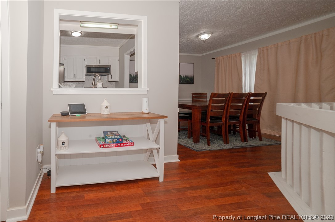 6005 Dalton Road Fayetteville, NC 28314 - Photo 6 of 44 a view of kitchen with furniture and window
