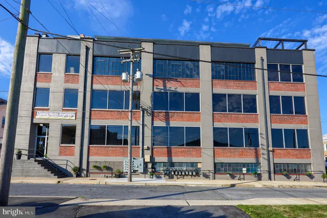 a view of a building and a street