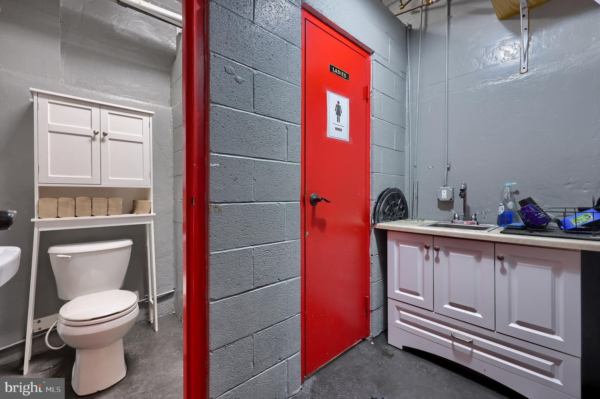 31 South Sterley Street, Unit 101 Shillington, PA 19607 - Photo 28 of 39 a bathroom with a toilet a sink and a shower