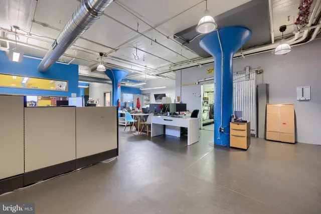 a work place with table and chairs