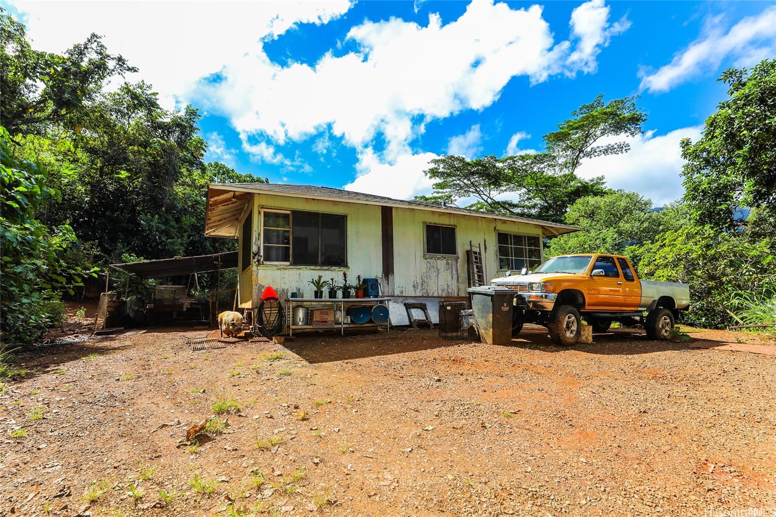 47-270 Ahuimanu Road Kaneohe, HI 96744 - Photo 18 of 25 a view of car parked in front of house