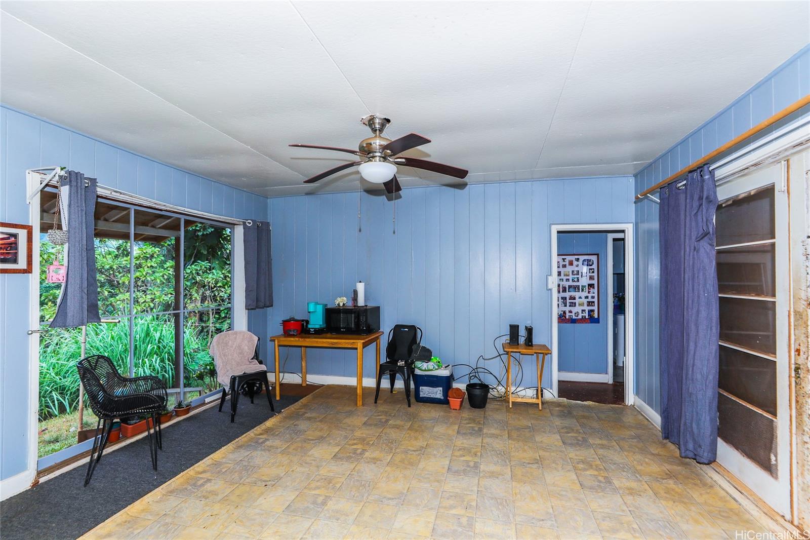 47-270 Ahuimanu Road Kaneohe, HI 96744 - Photo 22 of 25 a living room with furniture and a window