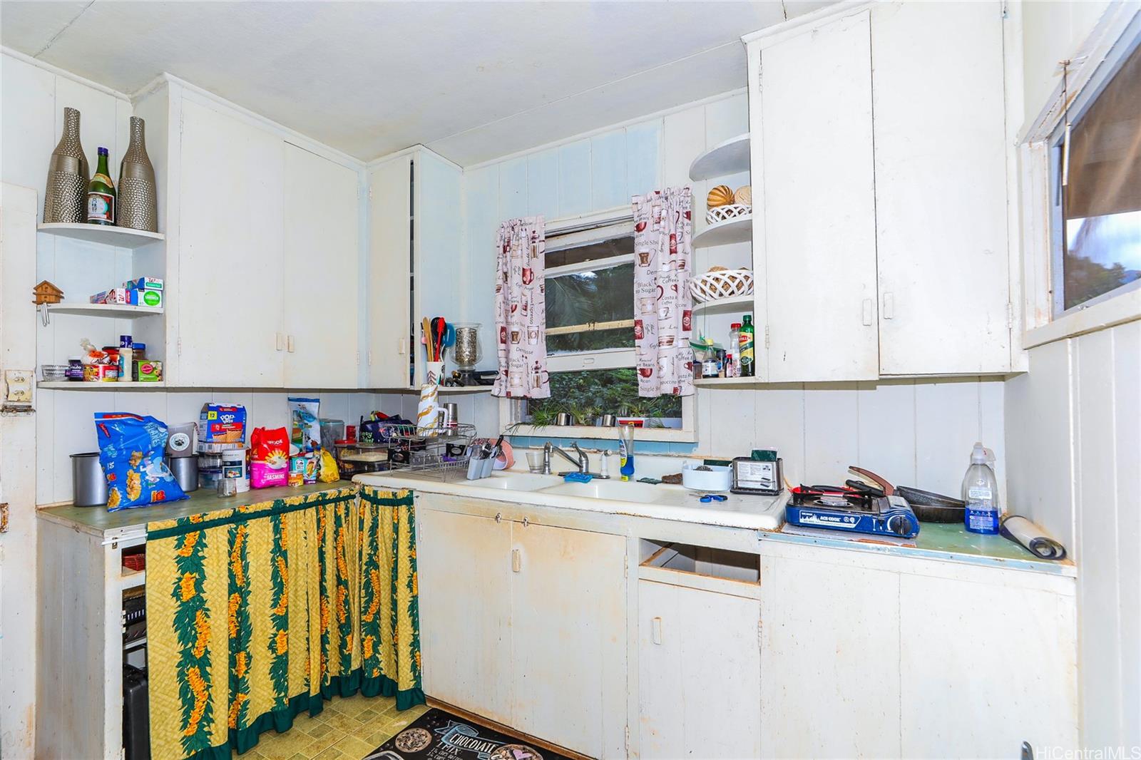 47-270 Ahuimanu Road Kaneohe, HI 96744 - Photo 23 of 25 a utility room with sink dryer and washer