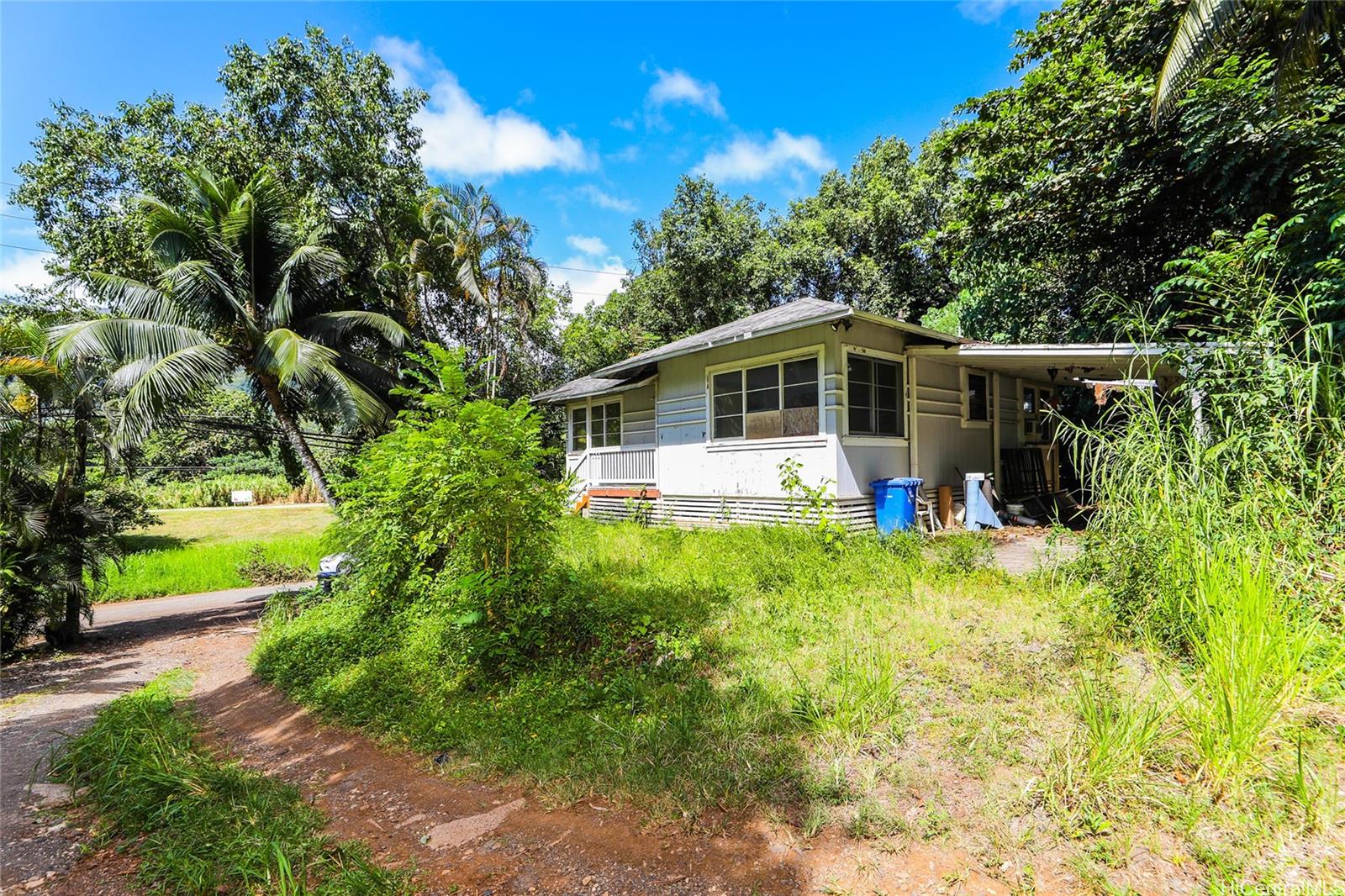 47-270 Ahuimanu Road Kaneohe, HI 96744 - Photo 3 of 25 a front view of a house with garden