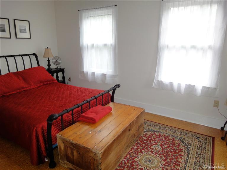 376 Lane Gate Road Cold Spring, NY 10516 - Photo 18 of 23 a bedroom with bed and a window