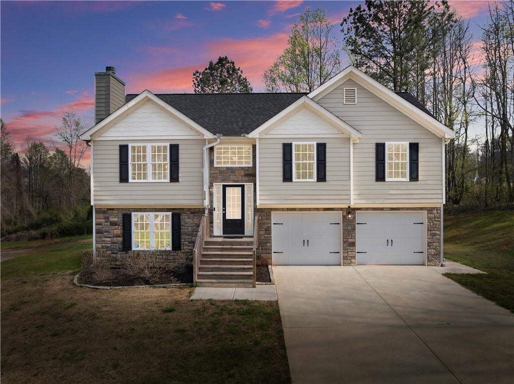 5430 Stepstone Way Gainesville, GA 30506 - Photo 4 of 39 a view of a house with a yard