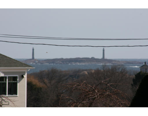 47 Beach Road Gloucester, MA 01930 - Photo 4 of 9 a view of a lake