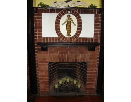 47 Beach Road Gloucester, MA 01930 - Photo 6 of 9 a close view of a fireplace in a room