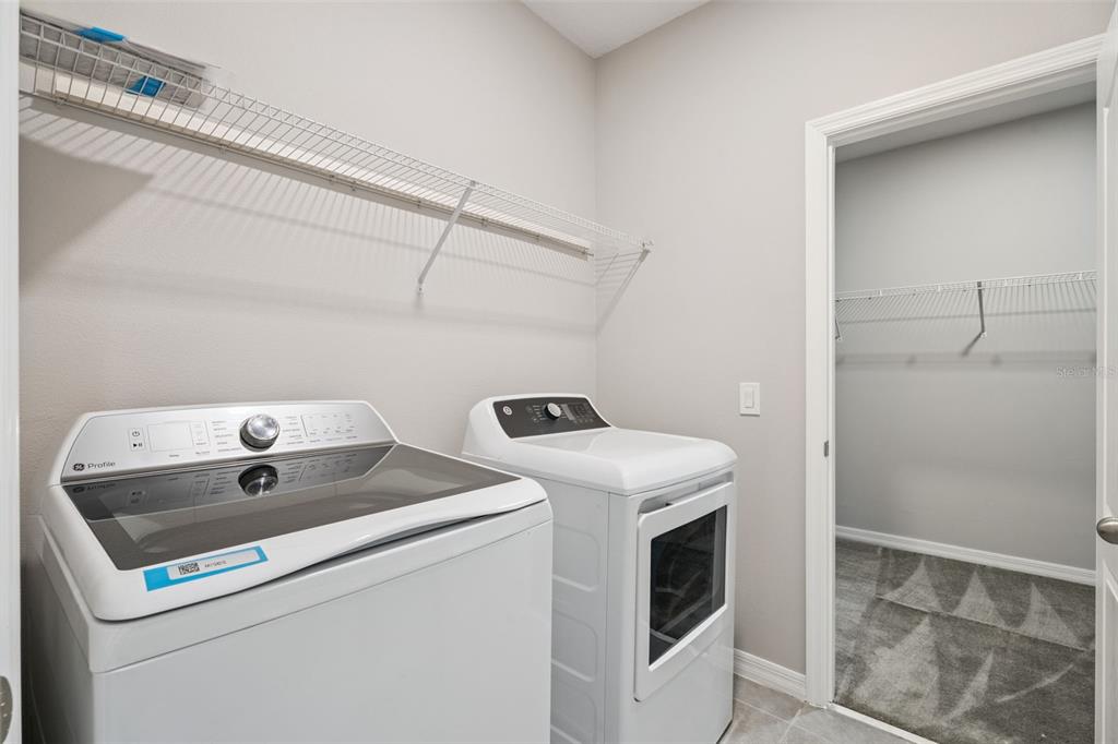 1915 Terrapin Road Ocoee, FL 34761 - Photo 15 of 25 a utility room with dryer and washer