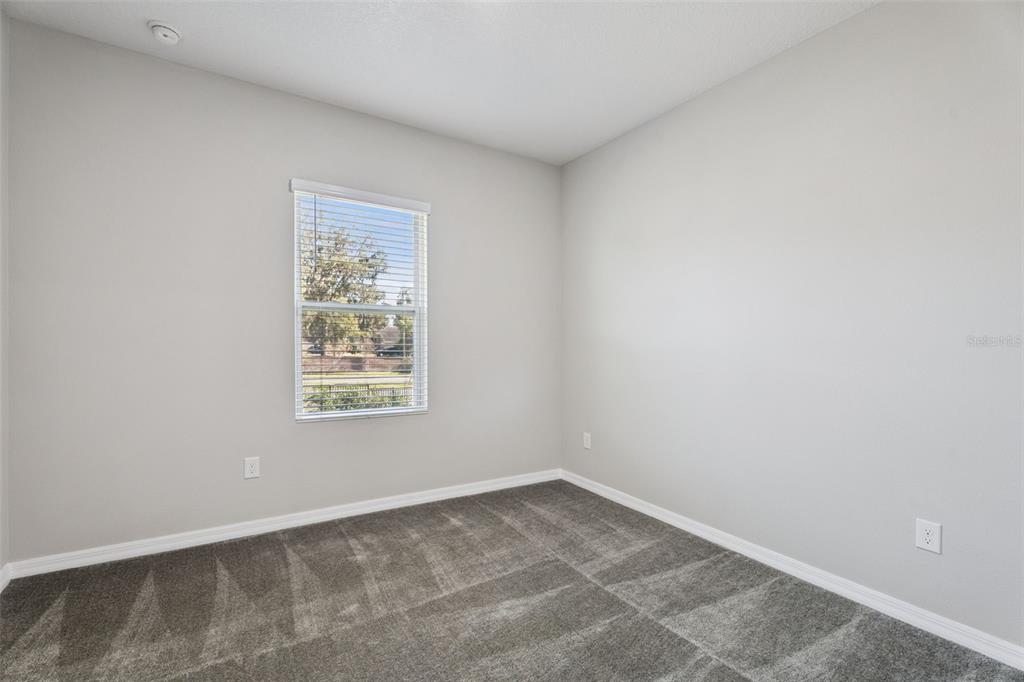 1915 Terrapin Road Ocoee, FL 34761 - Photo 18 of 25 an empty room with a window