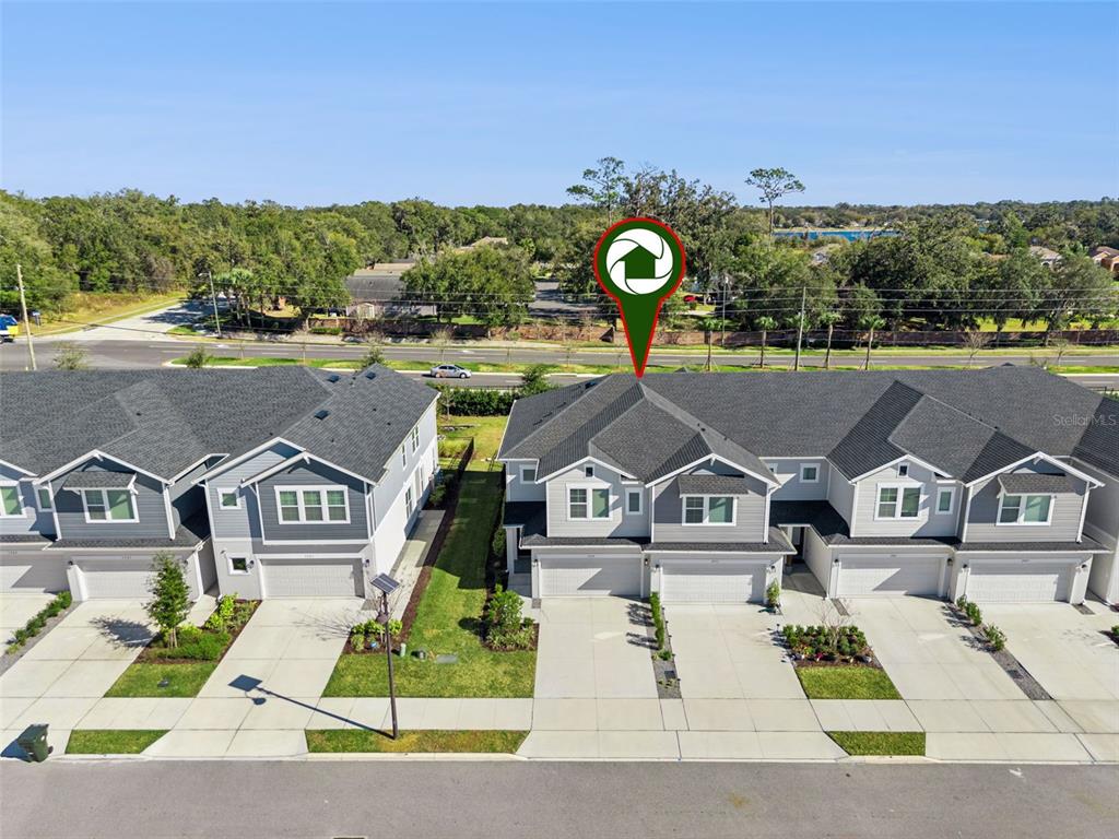 1915 Terrapin Road Ocoee, FL 34761 - Photo 23 of 25 an aerial view of residential houses with outdoor space and street view