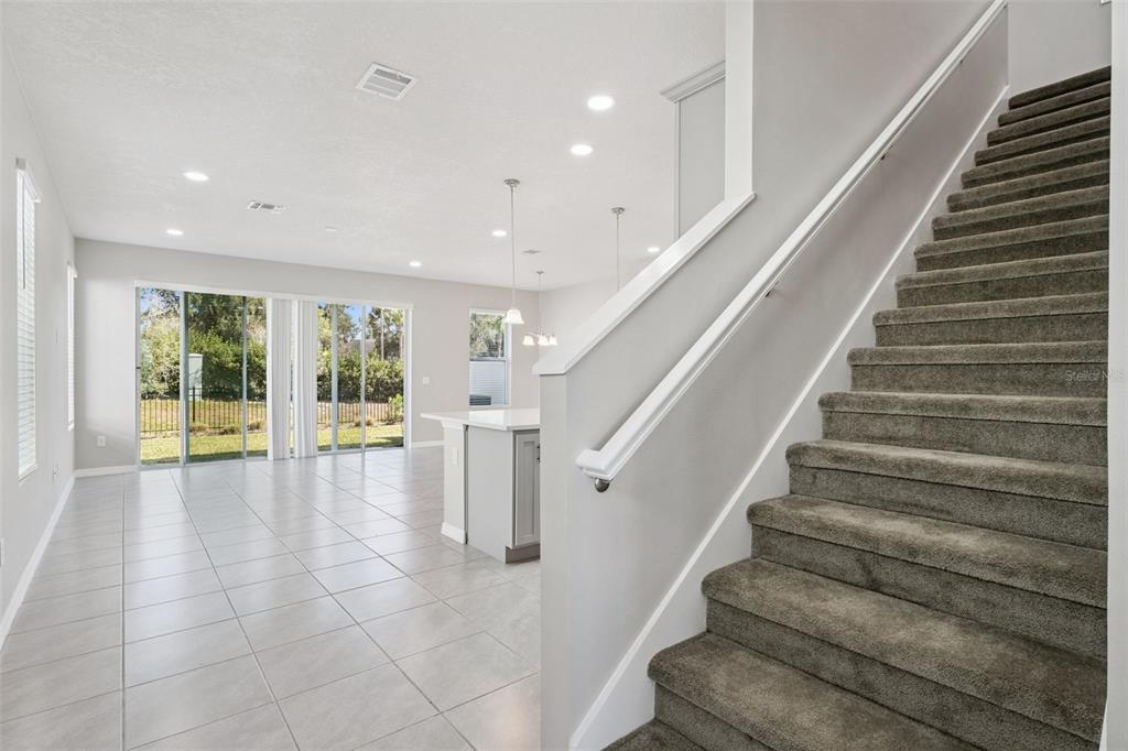 1915 Terrapin Road Ocoee, FL 34761 - Photo 10 of 25 a view of entryway and hall with wooden floor