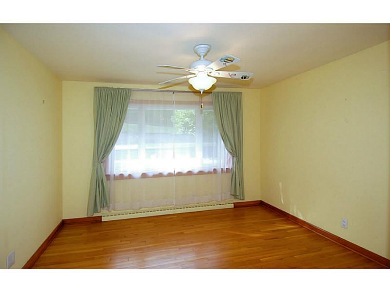 473 Perrymont Road Pittsburgh, PA 15237 - Photo 13 of 25 Bedroom. The third bedroom is the smallest. It is situated in the front of the house. It features a beautiful, large window and has a nice sized closet.