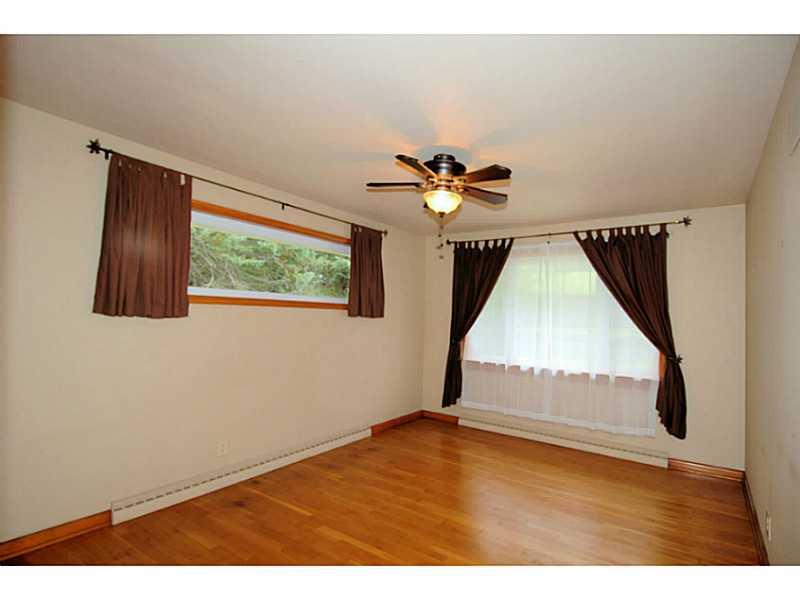 473 Perrymont Road Pittsburgh, PA 15237 - Photo 8 of 25 Master Bedroom. The master bedroom is situated in the front of the house and features 2 beautiful windows. It also has a generously sized closet.