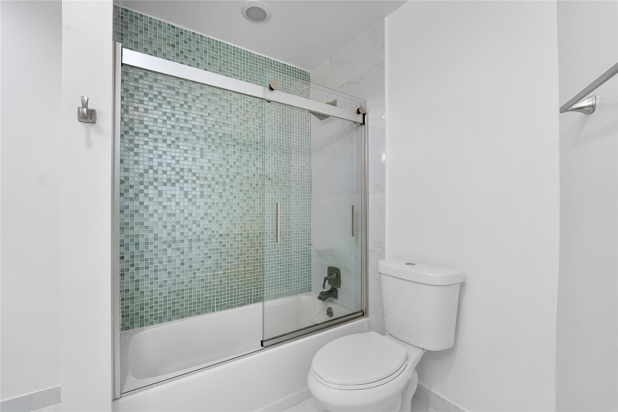 5351 Godfrey Road Parkland, FL 33067 - Photo 32 of 95 Another pretty updated white bathroom