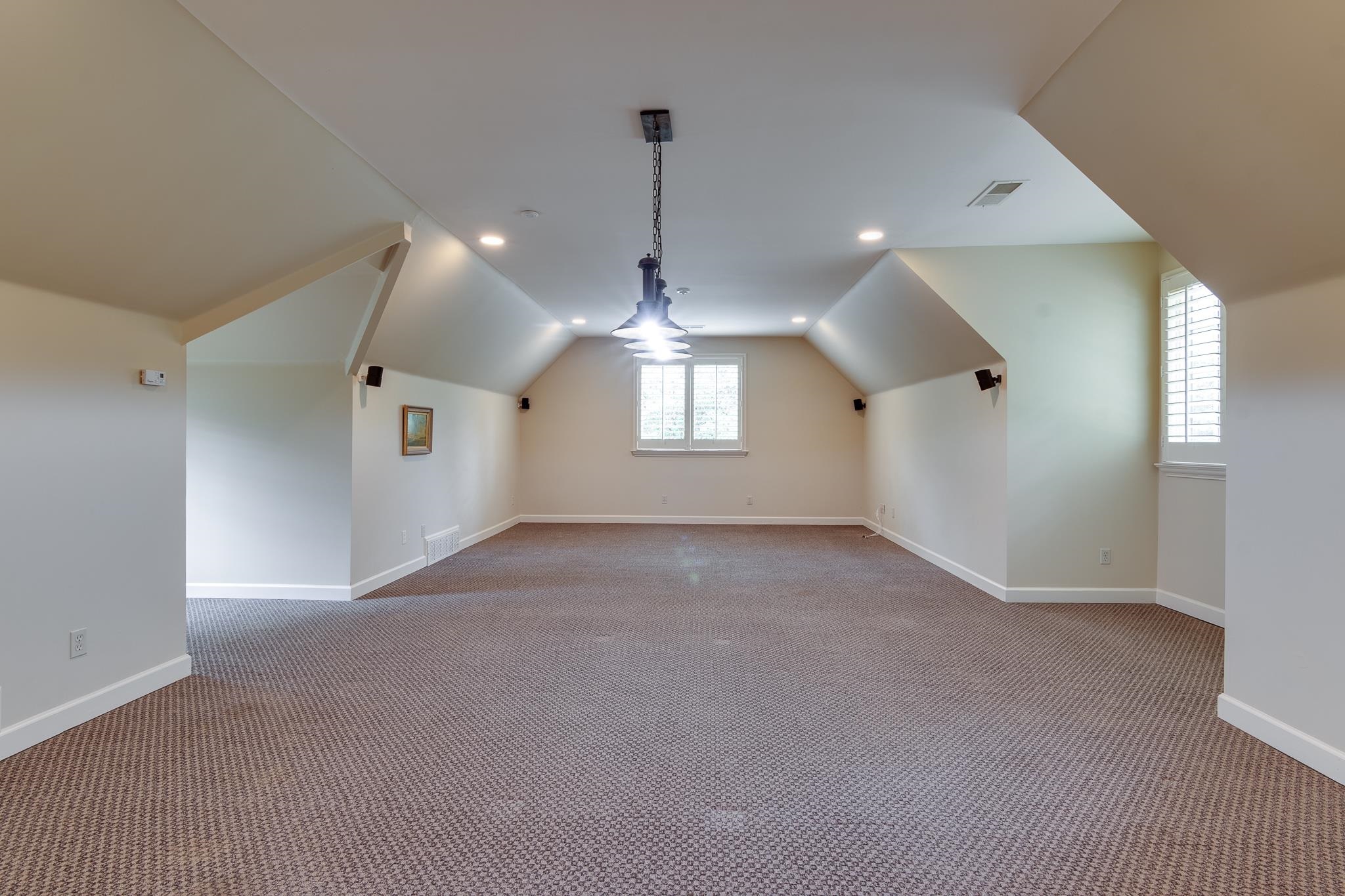 4865 Roane Road Memphis, TN 38117 - Photo 24 of 39 a view of a room with windows and ceiling fan