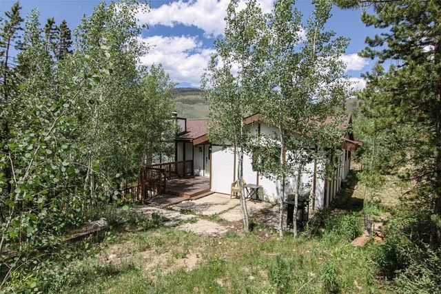 a view of outdoor space with deck and backyard