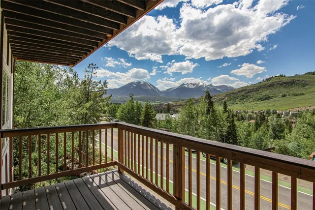 a balcony with an outdoor space