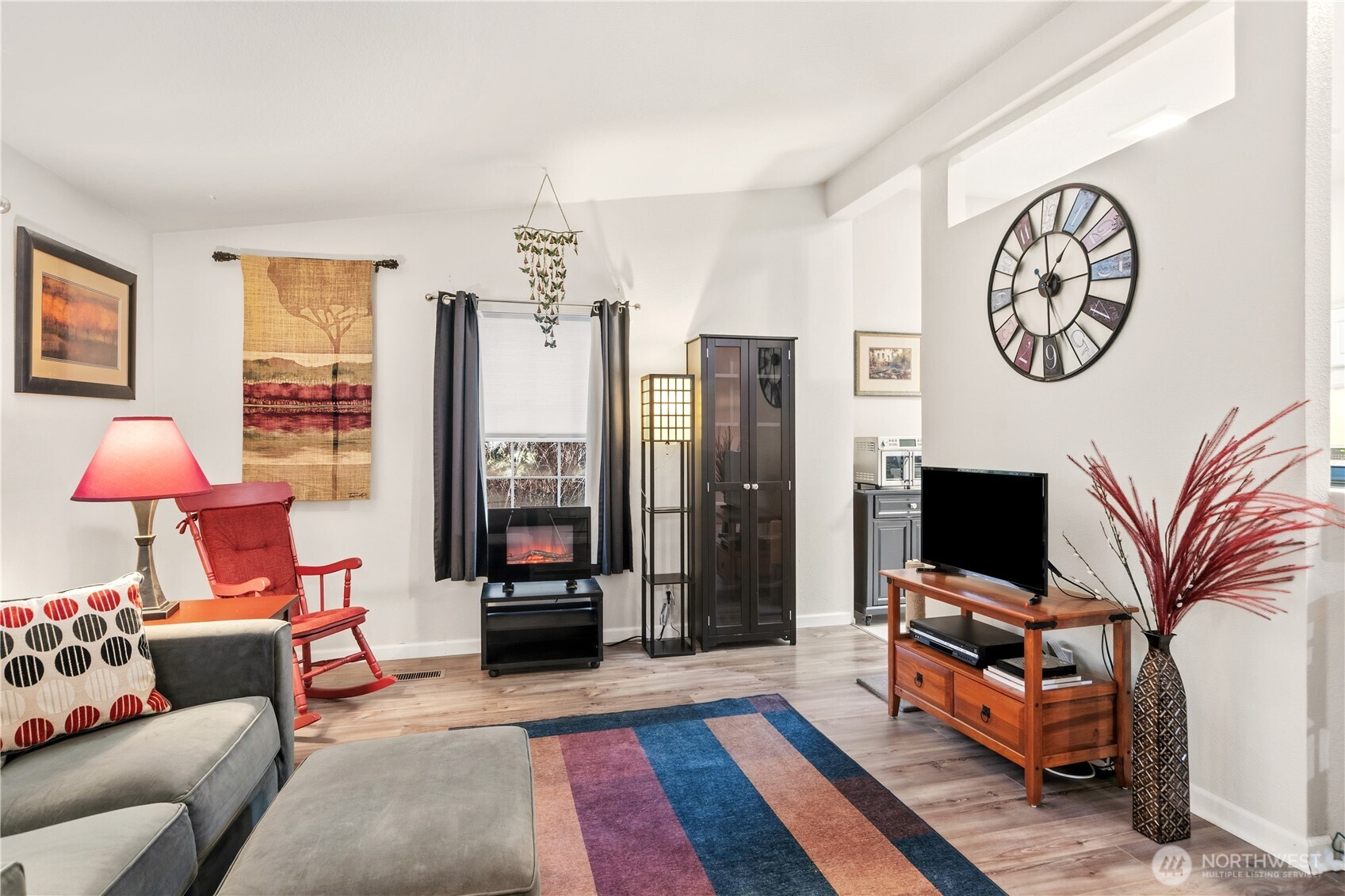 522 Frederick Street Port Townsend, WA 98368 - Photo 15 of 37 a living room with furniture and a flat screen tv