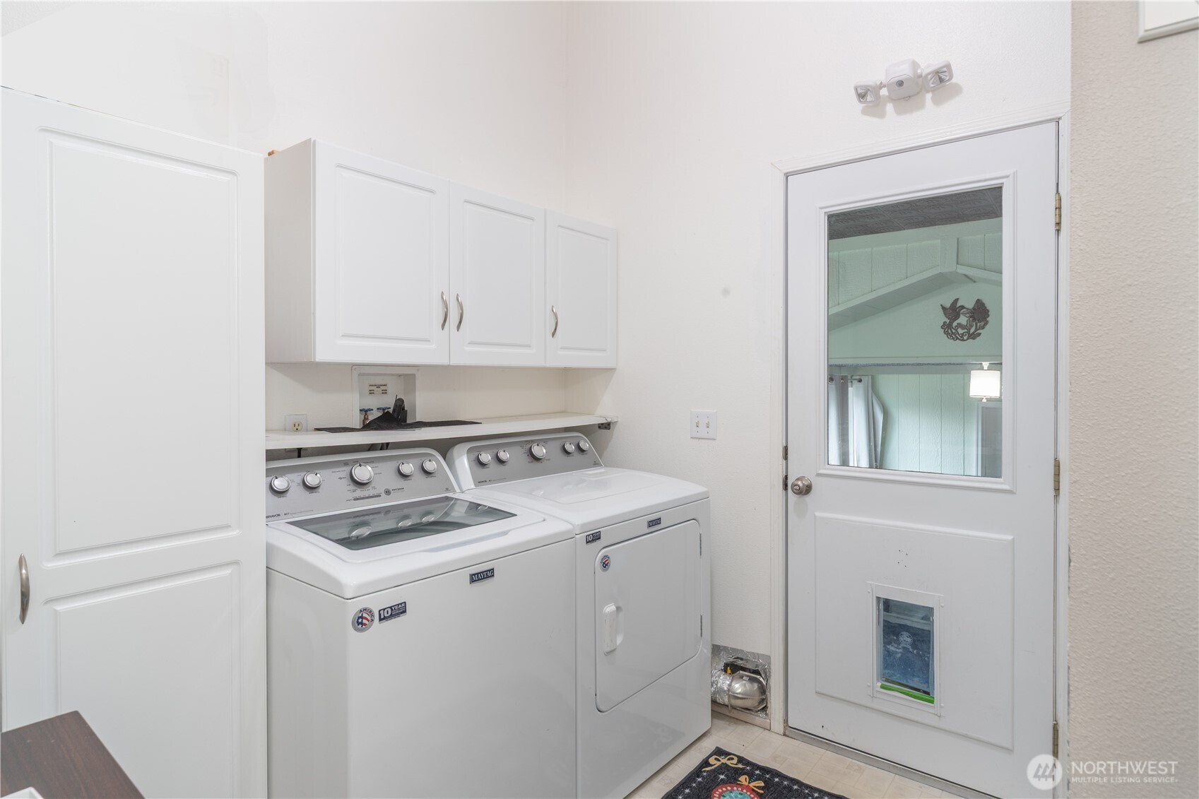 522 Frederick Street Port Townsend, WA 98368 - Photo 28 of 37 a kitchen with cabinets appliances and a sink