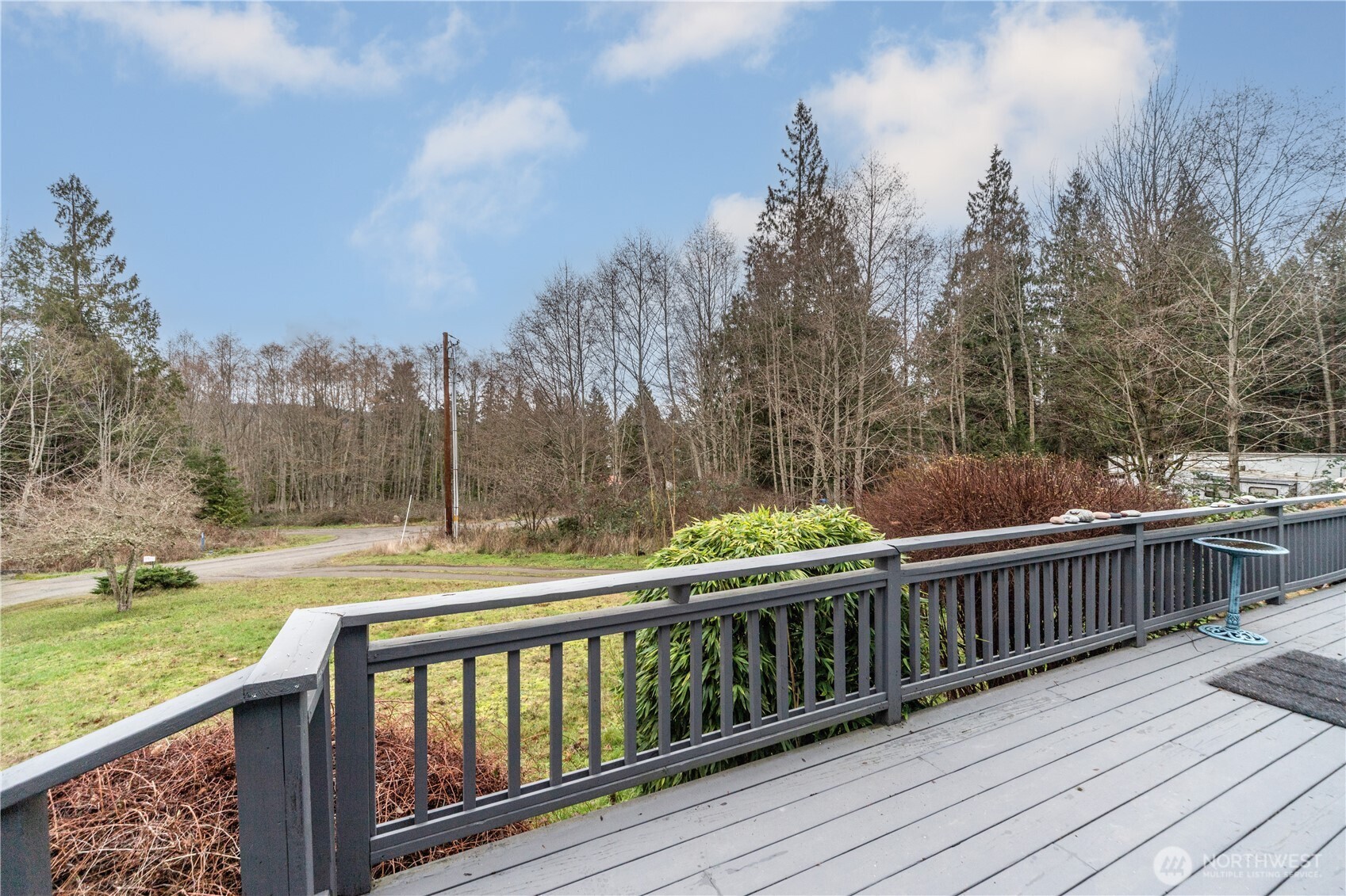 522 Frederick Street Port Townsend, WA 98368 - Photo 3 of 37 a balcony with wooden floor and fence