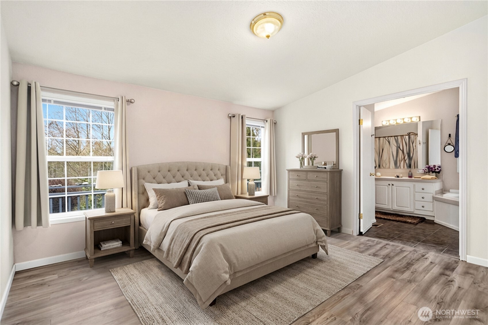 522 Frederick Street Port Townsend, WA 98368 - Photo 7 of 37 a bedroom with a large bed and a window