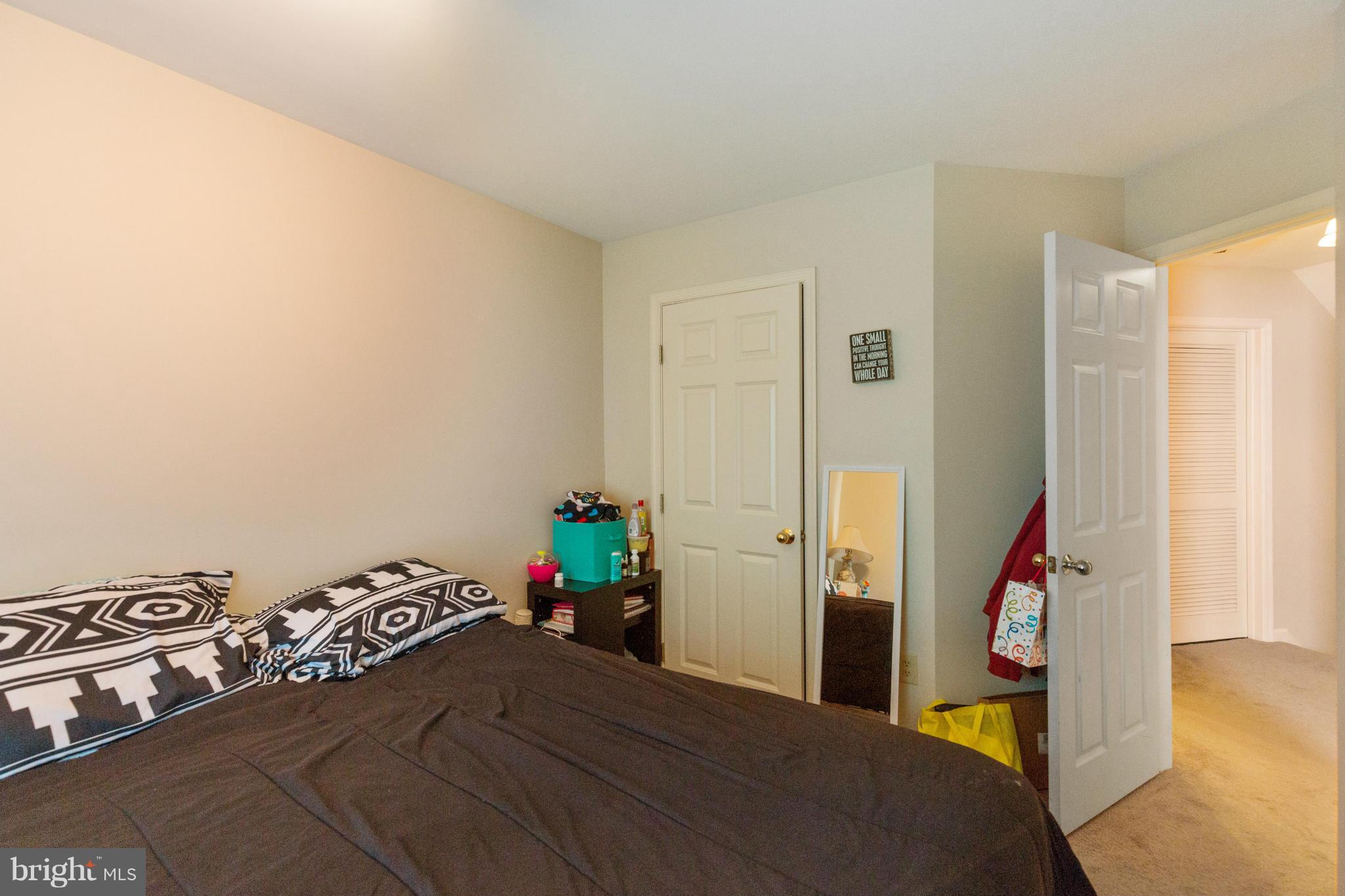 2005 Bell Point Court Odenton, MD 21113 - Photo 14 of 24 a bedroom with a bed and wooden floor