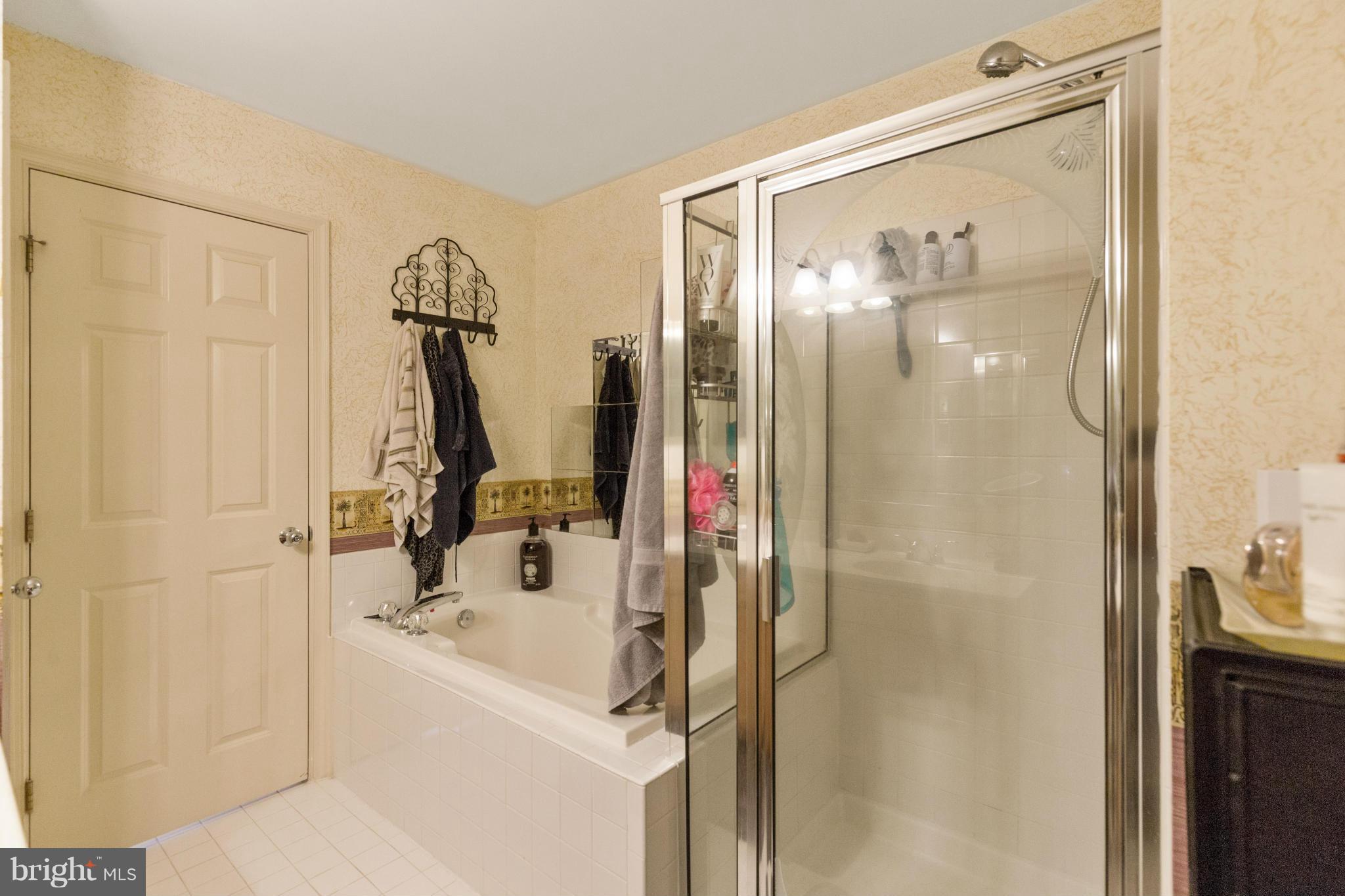 2005 Bell Point Court Odenton, MD 21113 - Photo 22 of 24 a bathroom with a shower and a sink