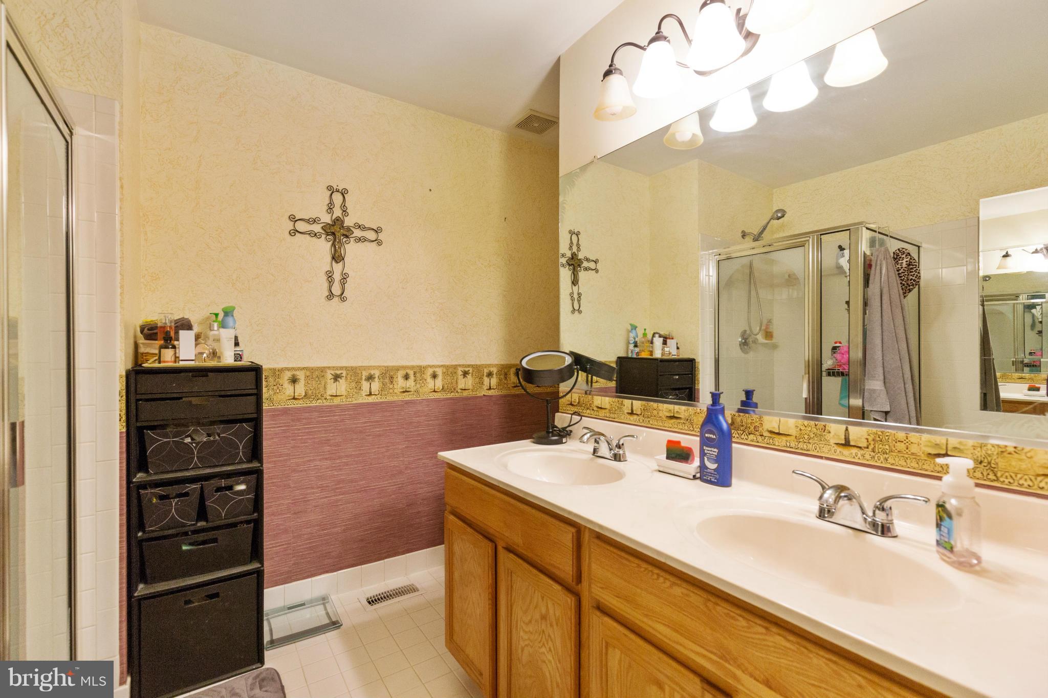2005 Bell Point Court Odenton, MD 21113 - Photo 24 of 24 a bathroom with a sink vanity and a mirror