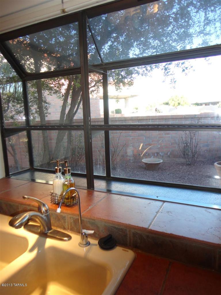 1429 North Bank Swallow Road Green Valley, AZ 85614 - Photo 7 of 34 a room with pool table and a large window