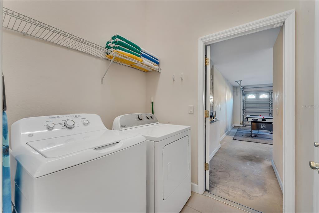 620 Old Bridge Circle Davenport, FL 33897 - Photo 17 of 22 a utility room with dryer and washer