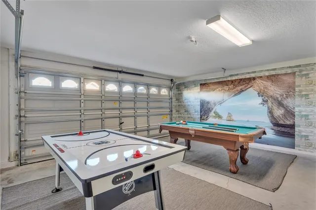 a bedroom with a bed and furniture