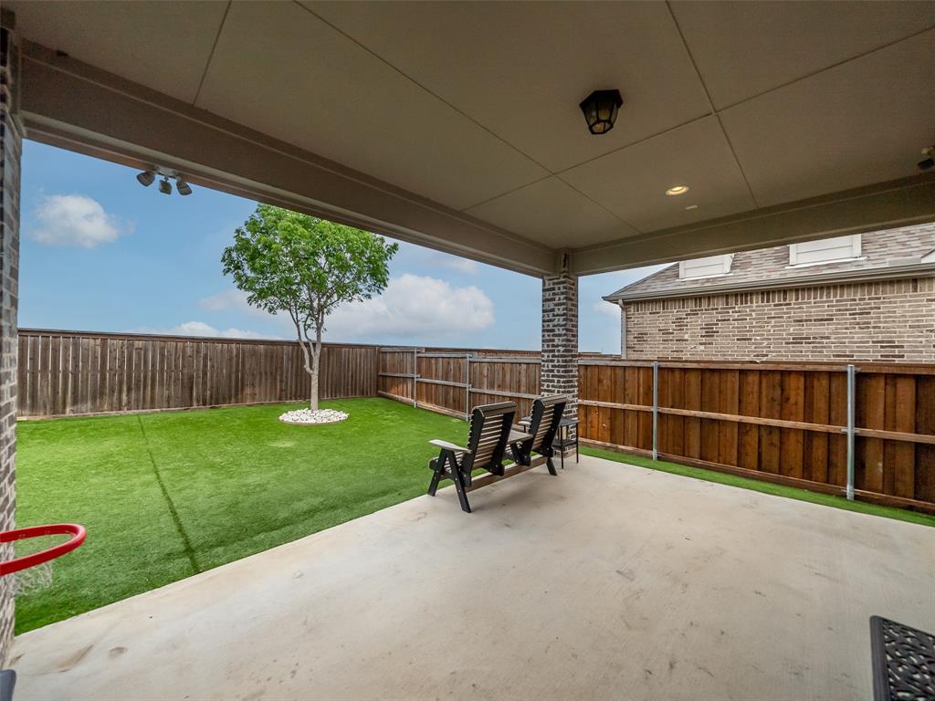 3044 Bold Ruler Road Celina, TX 75009 - Photo 22 of 36 a view of a room with a wooden deck