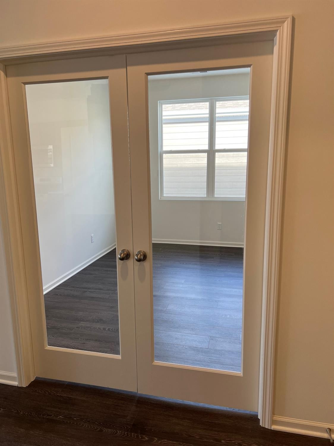 10400 Morse Place Crown Point, IN 46307 - Photo 12 of 33 a view of an empty room with wooden floor and a window