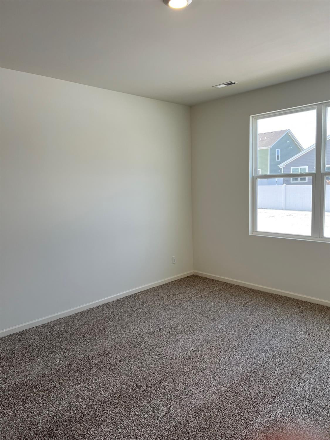 10400 Morse Place Crown Point, IN 46307 - Photo 13 of 33 an empty room with a window