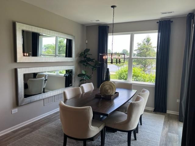 10400 Morse Place Crown Point, IN 46307 - Photo 21 of 33 a dining room with furniture and window