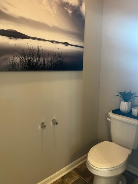 10400 Morse Place Crown Point, IN 46307 - Photo 24 of 33 a bathroom with a toilet sink and mirror