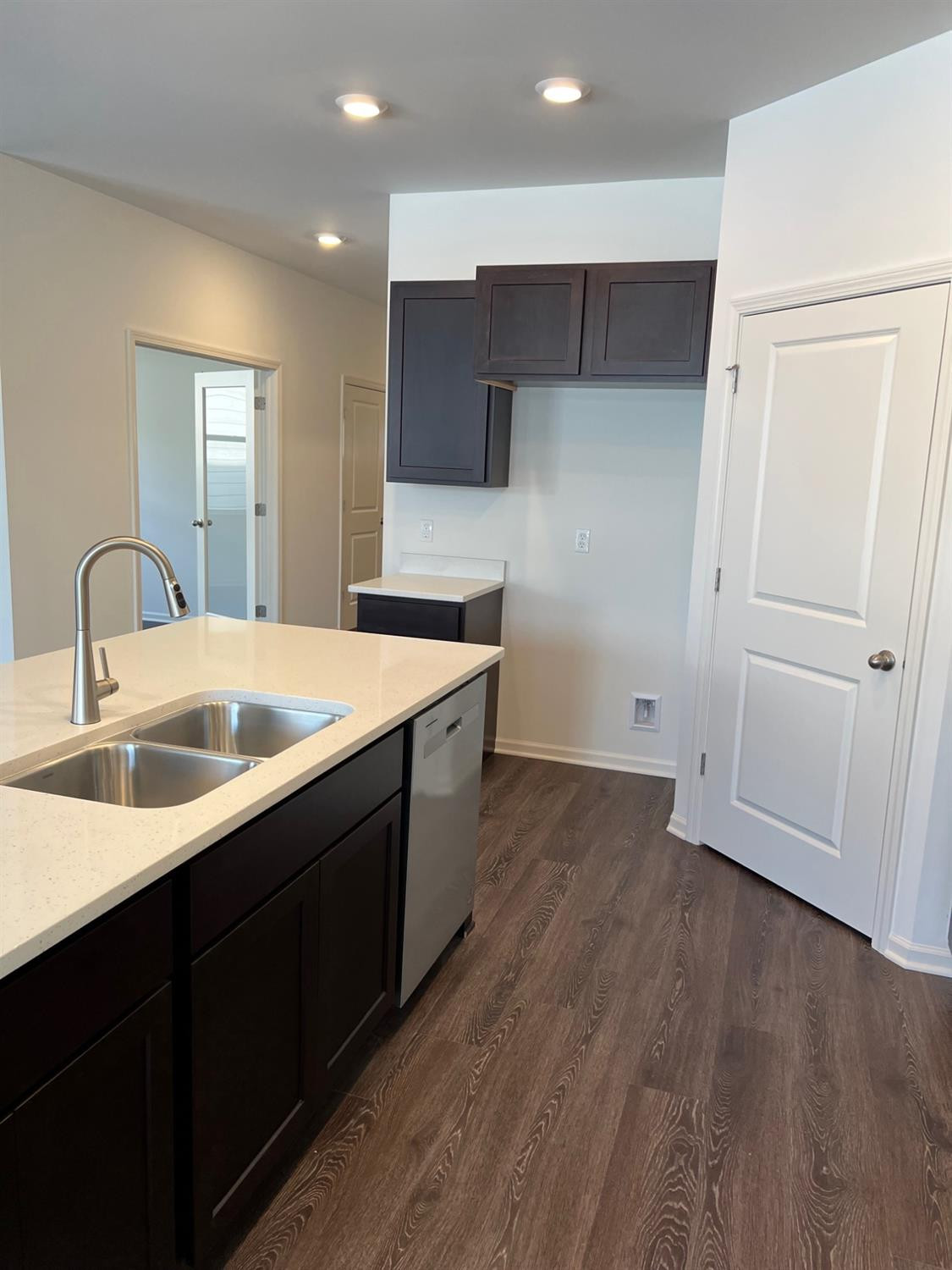 10400 Morse Place Crown Point, IN 46307 - Photo 5 of 33 a kitchen with a sink cabinets and wooden floor
