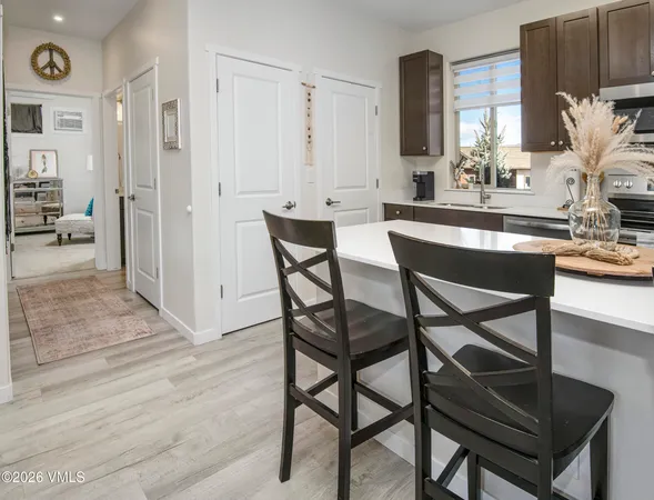 a room with a table and chairs