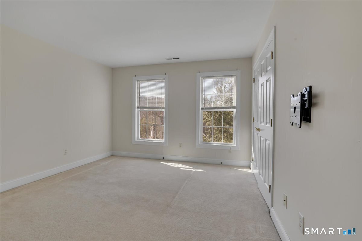 25 Fenwick Drive Avon, CT 06001 - Photo 27 of 40 a view of an empty room with a window
