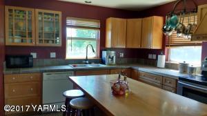 810 Red Tail Road Yakima, WA 98908 - Photo 10 of 42 a kitchen with a sink cabinets and window